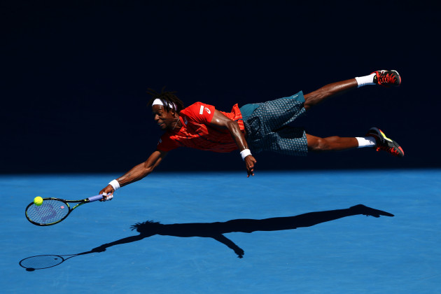 “Taken this week [last week of January, 2016], Gael Monfils diving for a forehand in his fourth round match against Andrey Kuznestov. I knew when it happened it would be a rare moment to catch – not many players launch themselves that far on a hard court. The sun was in a great position, and the light was incredible. Monfils was wearing a red shirt that just popped against the blue court. I couldn’t believe it when I saw I had also captured the ball in the shot and how high he had jumped – it all just came together for a perfect action photograph.” Photo by Cameron Spencer/Getty Images.