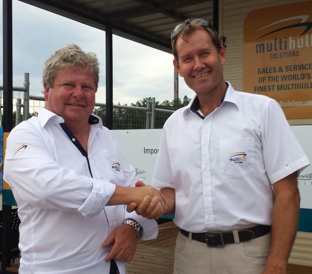 Welcome aboard: Mark Elkington (right) welcomes Steve Austin the new Multihull Solution's office at the Superyacht Marina in Sydney.