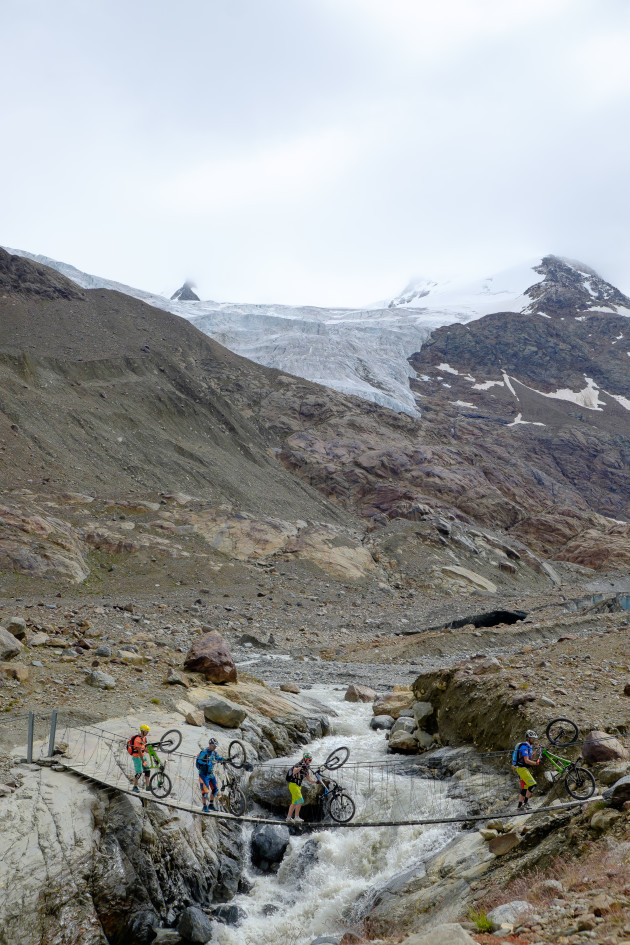 Tibetan-style suspension bridge high up on the Alta Rezia.