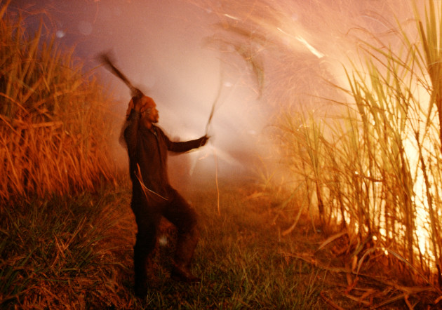 Tradition and change for the Zulu people of South Africa, in 1998. Sugar cane fields near Melmoth are cut down and burned off after the harvest. © Ed Kashi/VII Photo