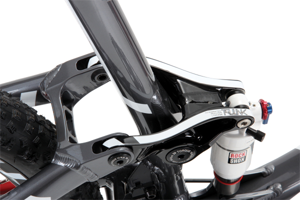 The widely spaced rocker link adds stiffness but also brushed our calves when pedalling.