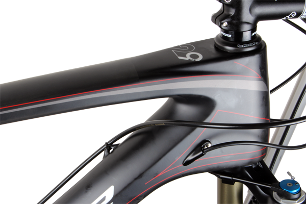 The left-side guides force the brake hose to take an extended journey around the head tube (assuming you have the rear brake on the left side of the bars). You can also take the more direct route on the left side of the head tube but that leads to more scuff-points on the frame.