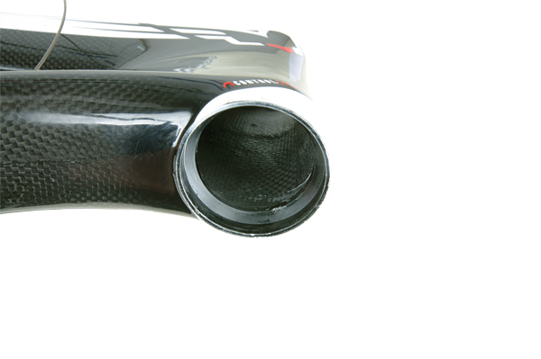 A look up the head tube reveals a slick finish both inside and out; a sure sign that this is a well-made carbon frame. Also note that there’s no need for headset cups—the bearings simply rest inside the all-carbon head tube.