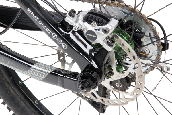 Post-style brake mounts mould seamlessly into the carbon seat stay. Also note the Syntace X12 thru-axle.