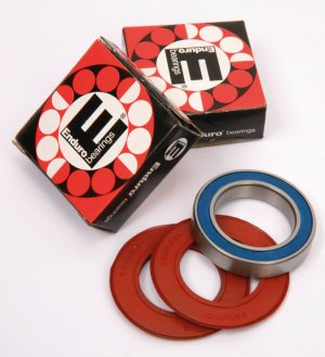 Enduro Bearings make replacement bearings for many applications with a choice of quality levels (you can even upgrade to ceramics if you choose). The Enduro kits replace the plastic dust shield with easy to fit rubber coated wiper seals (the red discs pictured here).