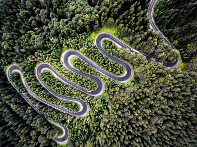 Infinity Road to Transylvania by Calin Stan.
The true beauty and winding nature of Cheia (DN1A), a road in Romania that leads you into Transylvania, can only be shown through aerials as depicted here.