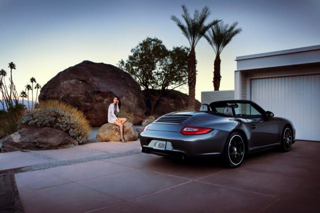 Porsche fashion spread, with grid-spot on talent from camera plus coloured graduated filter to darken sky. © Michael Grecco.