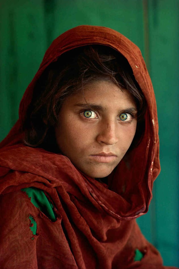Afghan Girl, Peshawar, Pakistan, 1984. Arguably McCurry’s most iconic image, and certainly his most famous shot. The image resonates deeply with a wide and diverse audience. Copyright Steve McCurry.