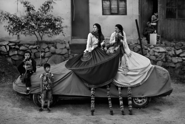 Break Time: Break time during a street theater festival known as FITECA. Periphery of Lima, Peru. Sharon Castellanos, Cusco, Peru.