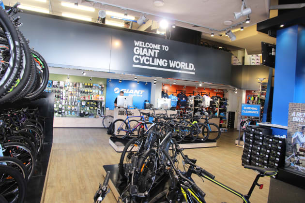 Giant South Yarra has a nice spacious feel thanks to the high ceiling and wide shop area. The workshop is in the mezzanine behind the large sign.