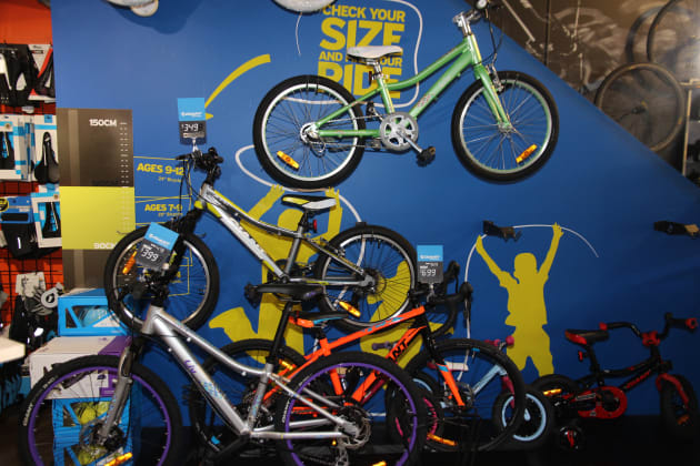 Strong graphics and a nice height chart turn this corner next to the stairs into an enticing kid’s section.