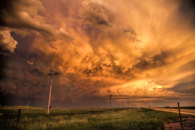 Montana was our destination...and although we were driving from Texas we had no plans for any storm chasing. However a small storm formed just outside of Gillette, Wyoming, where it put on a nice lightning show. As it started to die out the sun was setting and lit up the sky with some nice mammatus clouds and somewhat messy structure. Canon EOS 5DSR, 24-70mm lens @ 24mm, 1/80sec @ f6.3, ISO 320.