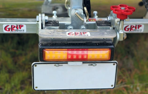 The optional LED number plate mount is a handy addition. Loosening the red knob on the right allows the rack to tilt.