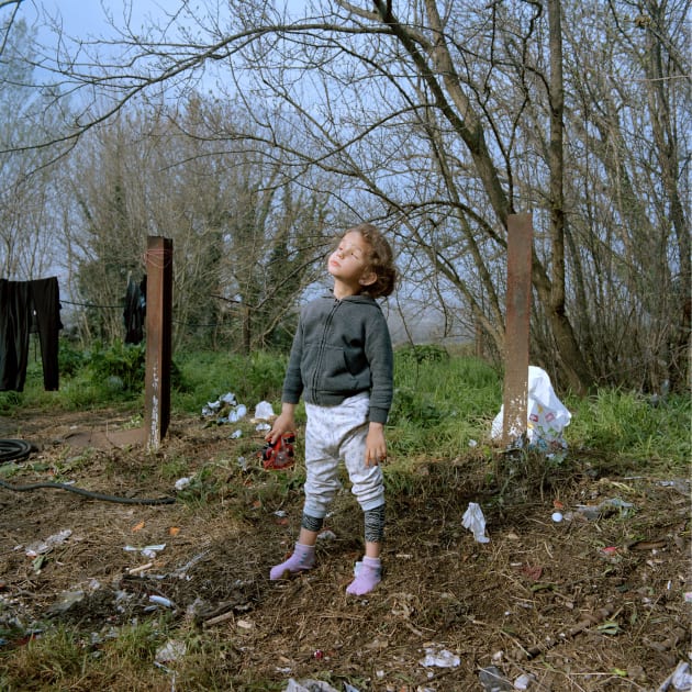 Portrait Prize - Second Place - Demetris Koilalous - Between Heaven and Hell.
“Blind girl playing in a dumpsite near an impromptu refugee campsite in Eidomeni, Greece.”