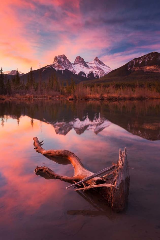 Three Sisters from Policeman's Creek, Canmore, Alberta, Canada. Canon EOS 5DMKIV, 16-35mm F4 lens, three exposures @ f/11, ISO200. Sirui Carbon fibre tripod and RRS BH55 ballhead, Nisi Landscape circular polarising filter. Exposure blending, colour and contrast adjustments in Lightroom CC and Adobe Photoshop CC.