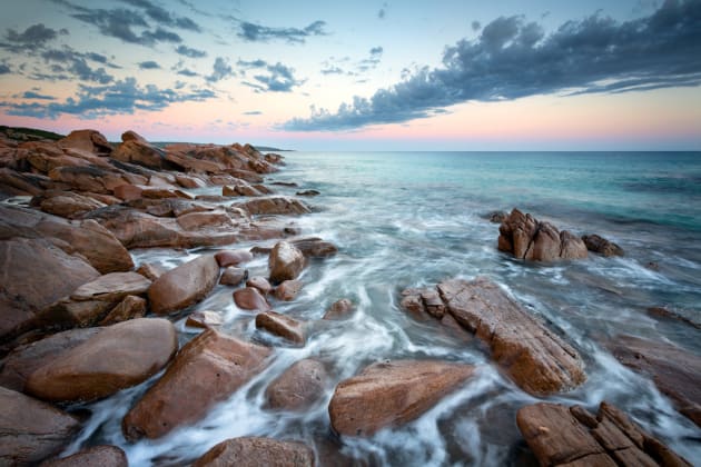 Point Piquet, Geographe Bay, Western Australia. This awesome little location for seascapes is also a popular whale watching spot. I didn’t see any while I was there but did find some great foreground flow over the rocks. The rocks complimented the shape of the long cloud remarkably well, and the soft warm tones on the horizon topped off a great little scene. Canon 5D Mark III, Canon 17-40 f/4L, 1.3 sec @ f/10, tripod