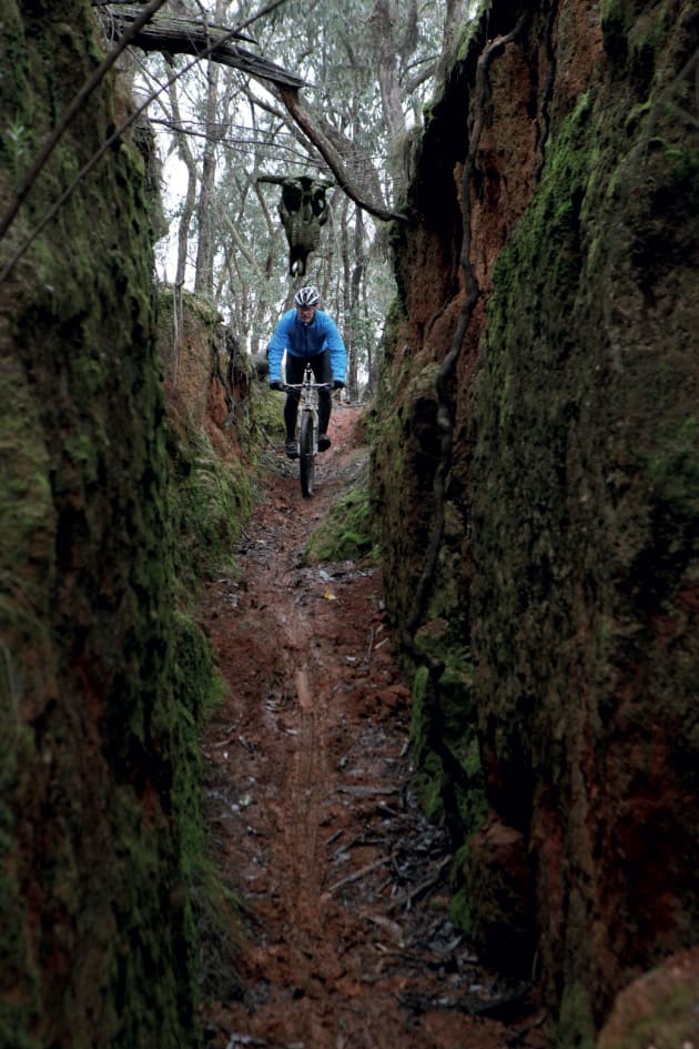 Dropping into the dirt chute on Carcass Canyon.