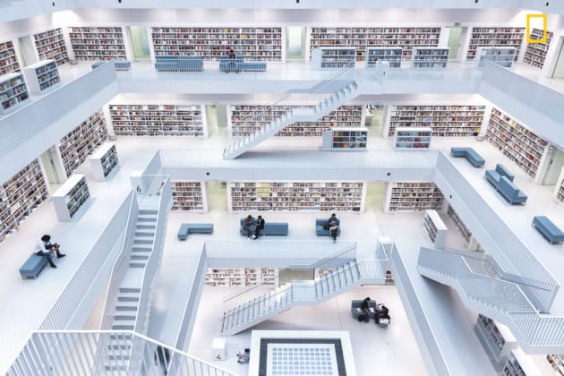 Photo and caption by Norbet Fritz/National Geographic Travel Photographer of the Year. 1st Place, Cities: Levels of reading.
The modern interior of the city library in Stuttgart. With its wide-open space in the central, where natural light comes from through the windows on the top, it has a very unique atmosphere, where you can broaden your knowledge.