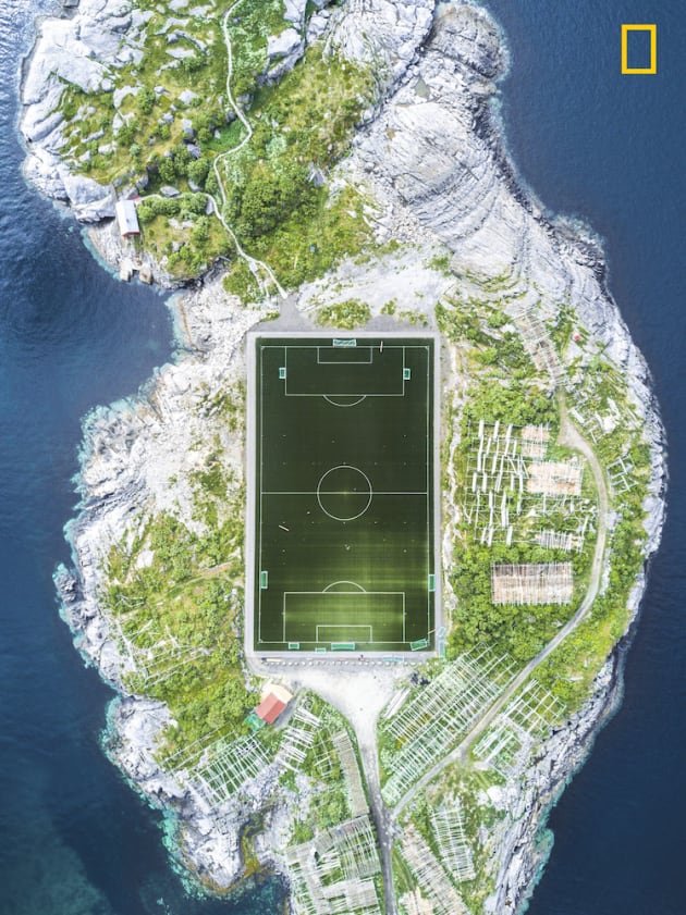 Photo and caption by Misha De-Stroyev/National Geographic Travel Photographer of the Year. 3rd Place, Cities: Henningsvær Football Field.
This football field in Henningsvær in the Lofoten Islands is considered one of the most amazing fields in Europe, and maybe even in the world. The photo was taken during a 10-day sailing trip in Norway in June 2017. We arrived to Henningsvær after a week of sailing through the cold and rainy weather. Upon our arrival, the weather cleared up. I was really lucky that the conditions were suitable for flying my drone, and I managed to capture this shot from a height of 120 meters.