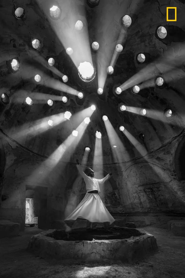 Photo and caption by F. Dilek Uyar/National Geographic Travel Photographer of the Year. 1st Place, People: worship.
This photo was taken in Konya. Willing Dervish in an historical place of Sille Konya Turkey.
The 'dance' of the Whirling Dervishes is called Sema and is a symbol of the Mevlevi culture. According to Mevlana's teachings, human beings are born twice, once of their mothers and the second time of their own bodies.