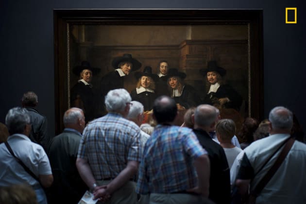 Photo and caption by Julius Y./National Geographic Travel Photographer of the Year. 2nd Place, People: Interesting moment.
Museum visitors curiously watching Rembrandt's painting " Syndics of the Drapers' Guild" where it gave the illusion that the people on the paintings too are curiously watching the visitors.