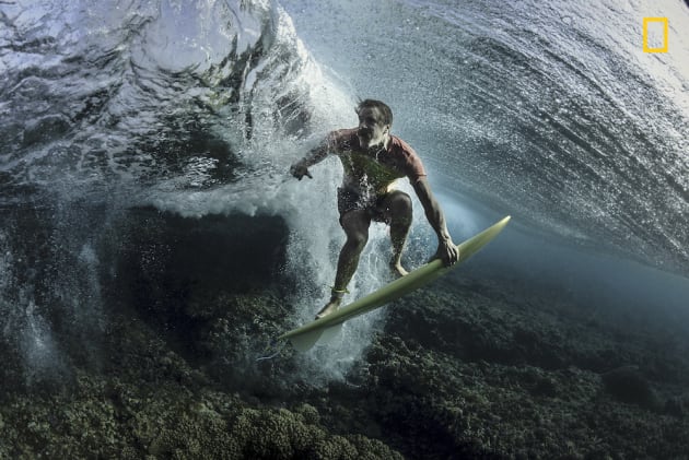 Photo and caption by Rodney Bursiel/National Geographic Travel Photographer of the Year. 3rd Place, People: Under The Wave.
I recently traveled to Tavarua, Fiji to do some surf photography with pro surfer Donavon Frankenreiter at Cloudbreak. I'm always looking for new angles and perspectives. The usual surf shots have all been done so we decided to get a little creative. Makes you look twice.