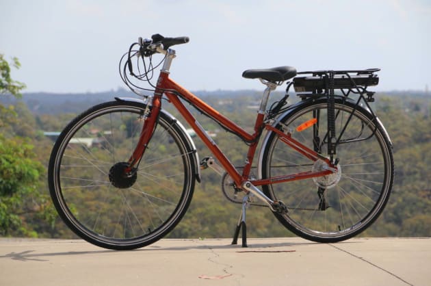 A regular, non-electric bicycle fitted with an Ebikeit conversion kit. $997 excluding fitting costs.