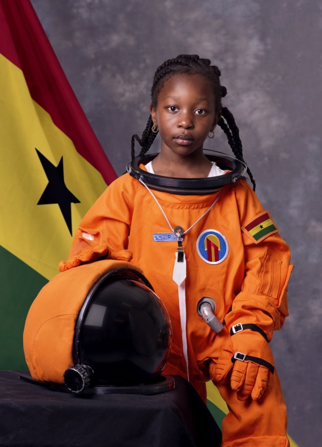 © Jørn Tomter. The Ghanaian Astronaut, UK. Wunnam is a pupil at Kingsmead Primary School in Hackney. The photo is part of a series of portraits of children dressed as astronauts. There is no more powerful fuel on the planet than a kid’s imagination.