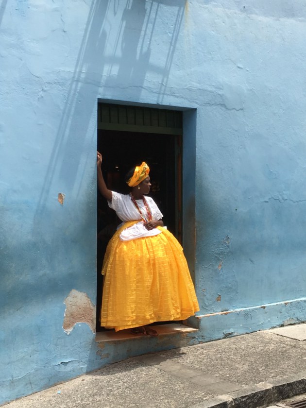 Photographer of the year, first place: The woman wearing the traditional clothes of a “baiana” takes a work break in Salvador de Bahia, Brazil. Shot with an iPhone 6S. (Alexandre Weber/IPPA)