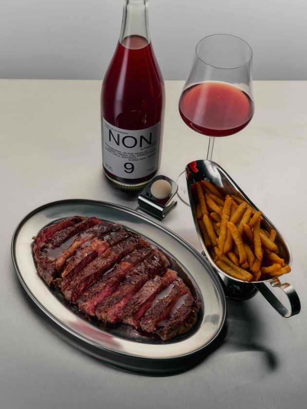 Just in time for winter roasts and long lunches, NON has launched its most food-focused release to date, a 0.0% red wine alternative – NON9 Oaked Blackberry & Plum. (Image: NON)