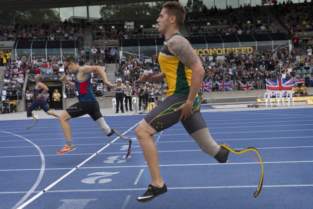 Australian Invictus Games 2018 competitor and Australian Army soldier Private Nathan Whittington crosses the finish line in the Men’s IT1 200m Final during the Games at Sydney Olympic Park. Defence