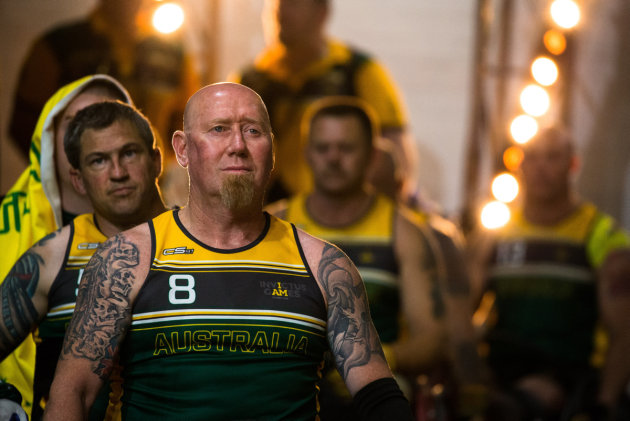 The Australian Invictus Games wheelchair rugby team, led by Jeff Wright and followed by Matt Brumby, prepare to take to the court prior the finals match against France, at Sydney Olympic Park. Defence