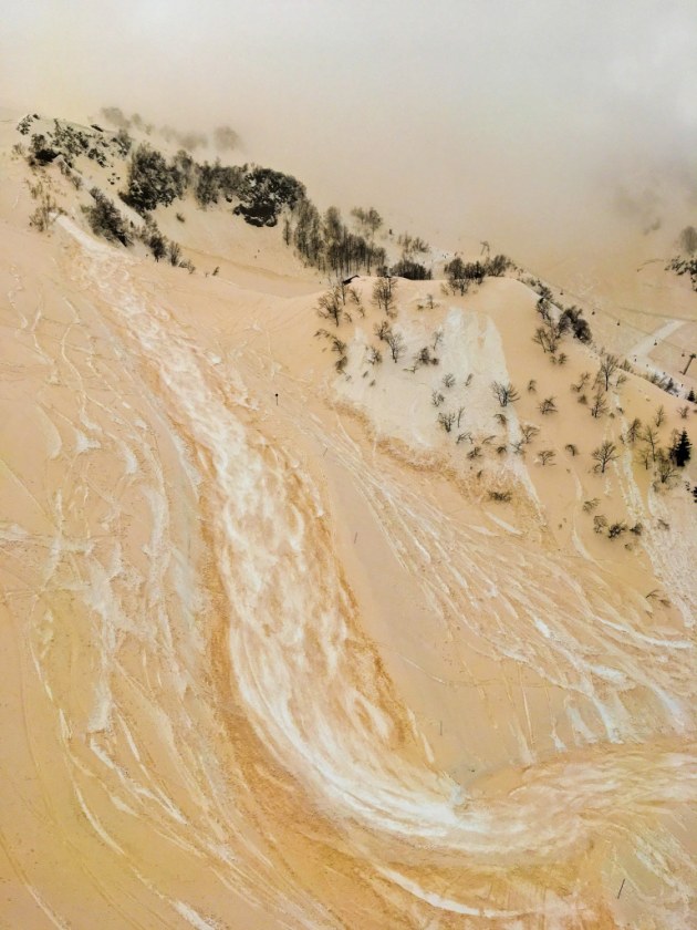 2nd Place – Nature: The Sand-snow river by Anton Kruglov, Russia
“The photo was taken in Sochi at an altitude above 1600m. On this day, there was a storm which had previously passed through the island of Crete, and so on the mountain the snow was covered with sand from the storm.”
Location: Rosa Khutor Ski Resort, Sochi, Russia. Shot on iPhone SE