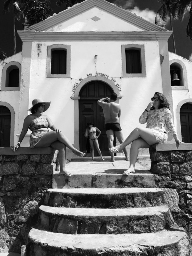 1st Place – People: Posers by Jonas Wyssen, Switzerland
“Brazilian tourists posing in front of a small catholic chapel taking a tourist photo.”
Location: Praia de Carneiros Pernambuco, Brazil. Shot on iPhone 7 Plus