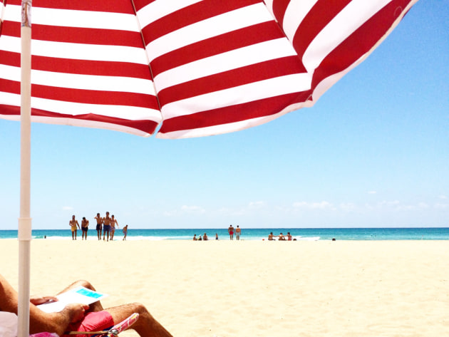 3rd Place – Travel: Red Stripes by Soha Ghandour, Lebanon
“Tanning by the coast in Tyre on a hot summer day.”
Location: Tyre, Lebanon. Shot on iPhone 5