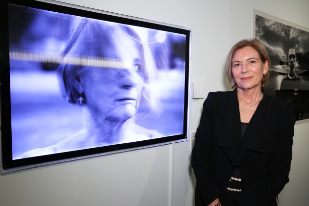 Marian Drew next to Belinda Mason's winning portrait, Taken.