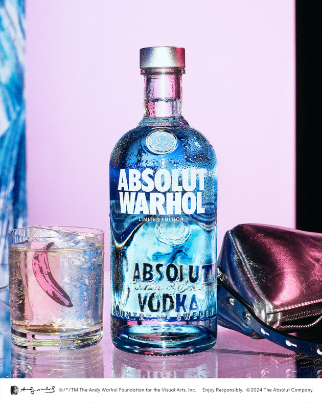 The limited-edition bottle has a visually artistic and layered aesthetic due to the multi-layered screen-printed design.