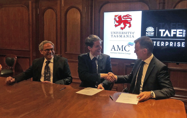 College of Sciences and Engineering executive dean, Professor Brian Yates, University of Tasmania vice-chancellor, Professor Rufus Black, and TAFE NSW chief operating officer, Glen Babington, sign the memorandum of understanding.