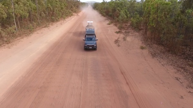 Corrugated tracks and red dust: the AMM combo on the road.