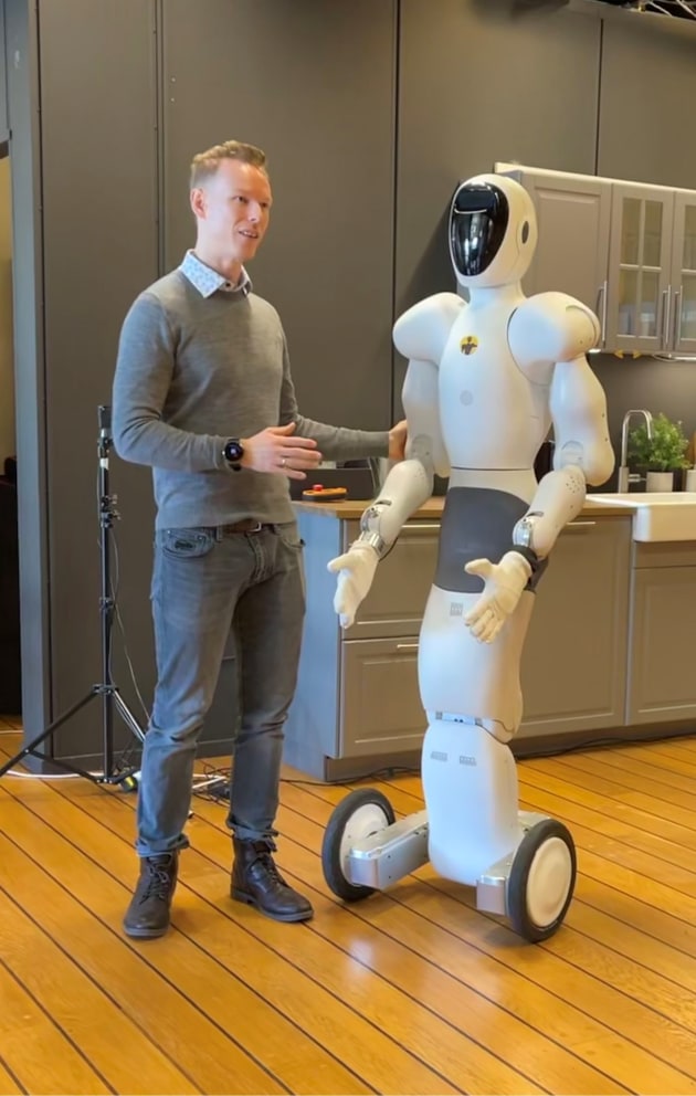 Halodi Robotics’ CEO, Bernt Bornich, together with the robot.