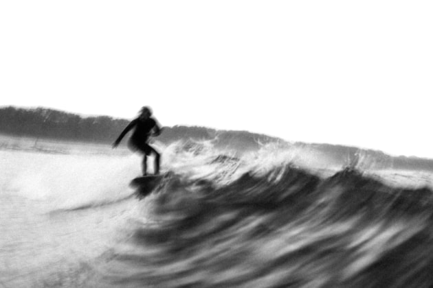 © Drew Hopper - Surfer riding the face of a shorie at Emerald Beach, NSW Australia. Fujifilm X-T2, Fujifilm 10-24mm f/4 @ 23mm. 1/30s @ f11, ISO 400.