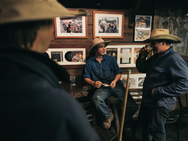 Local young farmers Lehman Laverty, Conner Johnston and Zak Single inside the Pub With No Beer, Taylors Arm, NSW Australia. Image courtesy Australian Geographic.