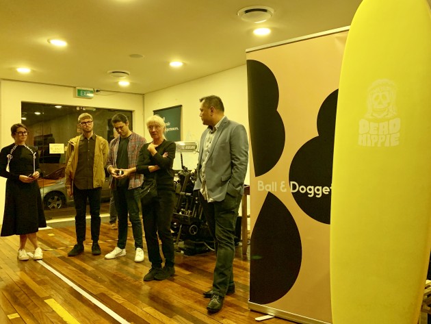 The evening's anti-waste evangelists agree: make a start no matter how small your idea, it's better than not starting at all. From left: Designer Clare Mueller; Rupert Gillies and Tom Hobbs of surfboard company Spooked Kooks; Jutta Birkenhauer of G . F Smith and Scott Chung of Ball & Doggett. In the foreground is the Spooked Kooks surfboard made in part from recycled plastics that was the lucky door prize for the evening.