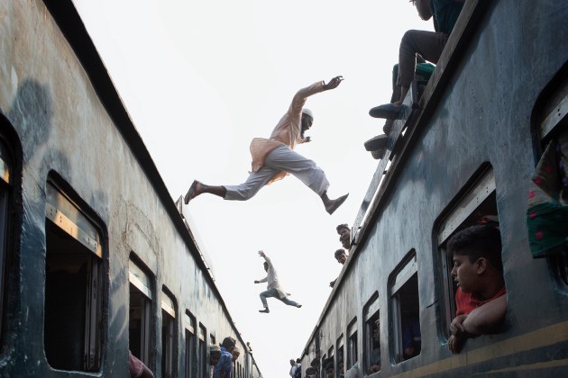 'Leap of faith'. This shot was taken in Dhaka, Bangladesh during the annual Biswa Ijtema festival. The Bishwa Ijtema (“world gathering”) is a very large Muslim congress that takes place annually, the second largest Muslim congregation after the Hajj pilgrimage. Image: Adrian Whear/Supplied