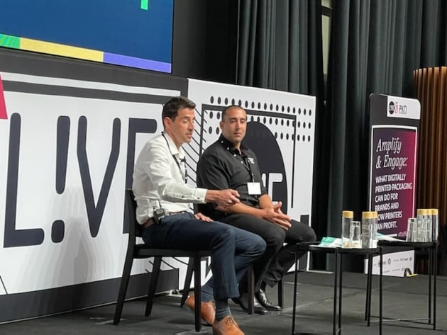 Jason Brown, managing director of ePac ANZ joined on stage by one of his clients, Brian Nasr, founder of Healthy Food Crew.