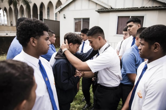 © Dominic Lorrimer. Lorrimer's winning image of the school students prior to performing the Haka.