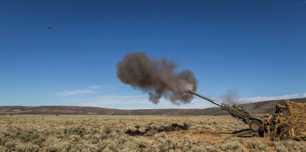 Australian Army soldiers from 8th/12th Regiment fire the 155 mm M777A2 towed lightweight howitzer during Exercise Thunder Run at Cultana training area. Credit: Defence