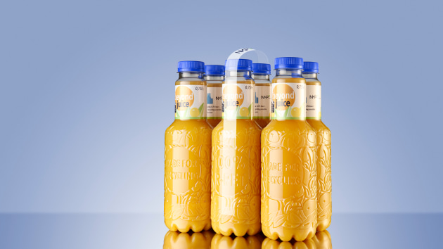 The Beyond Juice bottle is also available as a film-free pack. Thanks to the Nature MultiPack packaging system the bottles are held together by dots of adhesive which are strong and secure yet easy to remove, according to KHS. (Source: KHS)