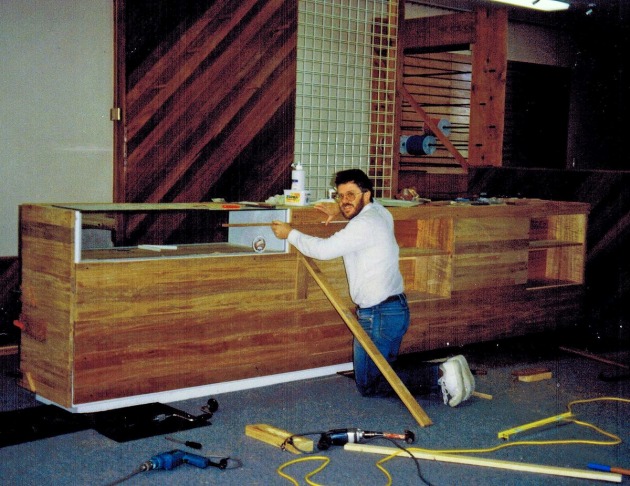 Neil Working from the counter from the new shop in 1995. Image supplied