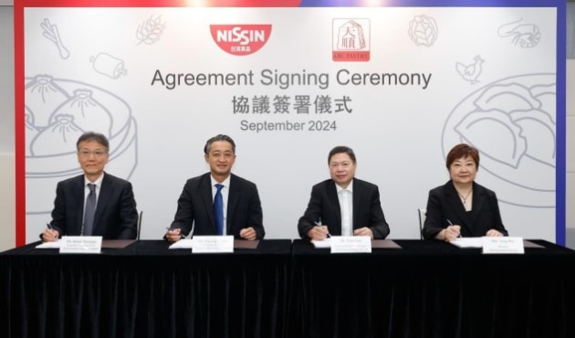 Official signing of Nissin Foods Company’s acquisition of ABC Pastry (l-r): Nissin Foods executive director and CFO, Shinji Tatsutani, Nissin Foods executive director, chair, and CEO, Kiyotaka Ando, ABC Pastry director and GM, Peter Gao, and Min Investments director, Tong Wu. (Image: Nissin Foods Co)